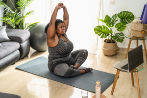 Coach Breanna a pigeon pose variation.